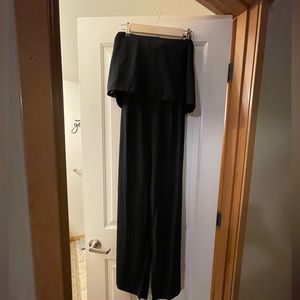 Black jumpsuit with strap back cut out